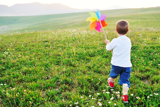 Child Playing in Nature