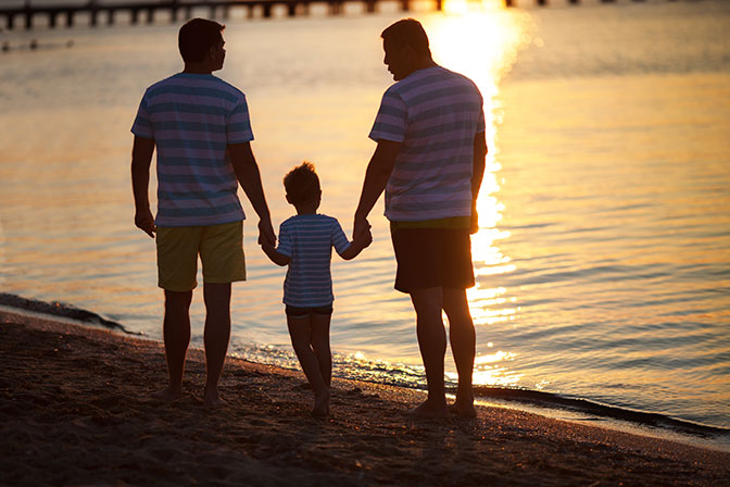 Family on Beach at Sunset